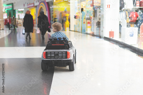 child driving electric toy car © avtk