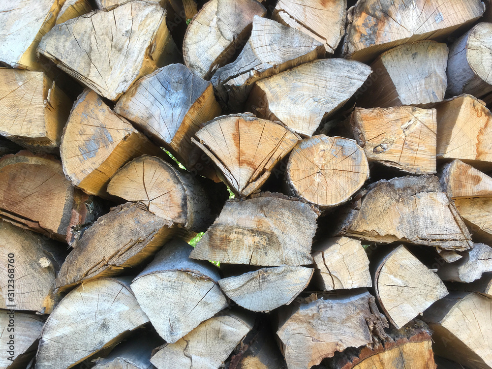 Stacked firewood (woodpile) for an open-air stove Stacked firewood (woodpile) for an open-air stove