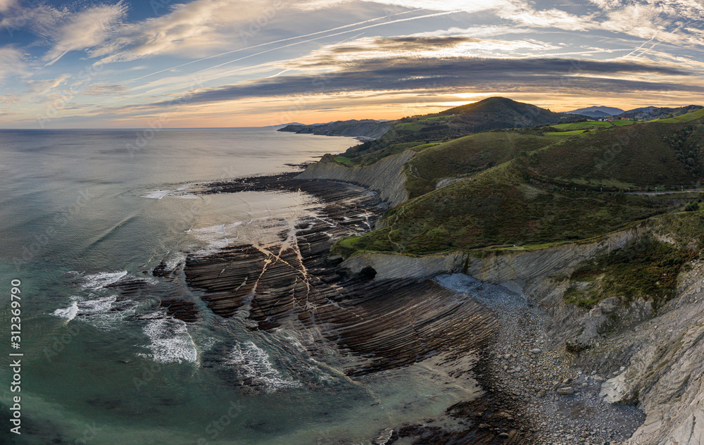 Zumaia flysch geological strata layers drone aerial view, Basque Country