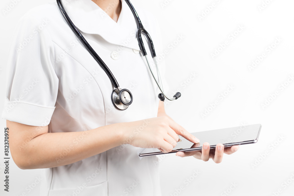Young asian nurse with a stethoscope using a digital tablet, isolated over white background. Young asian nurse with a stethoscope using a digital tablet, isolated over white background.