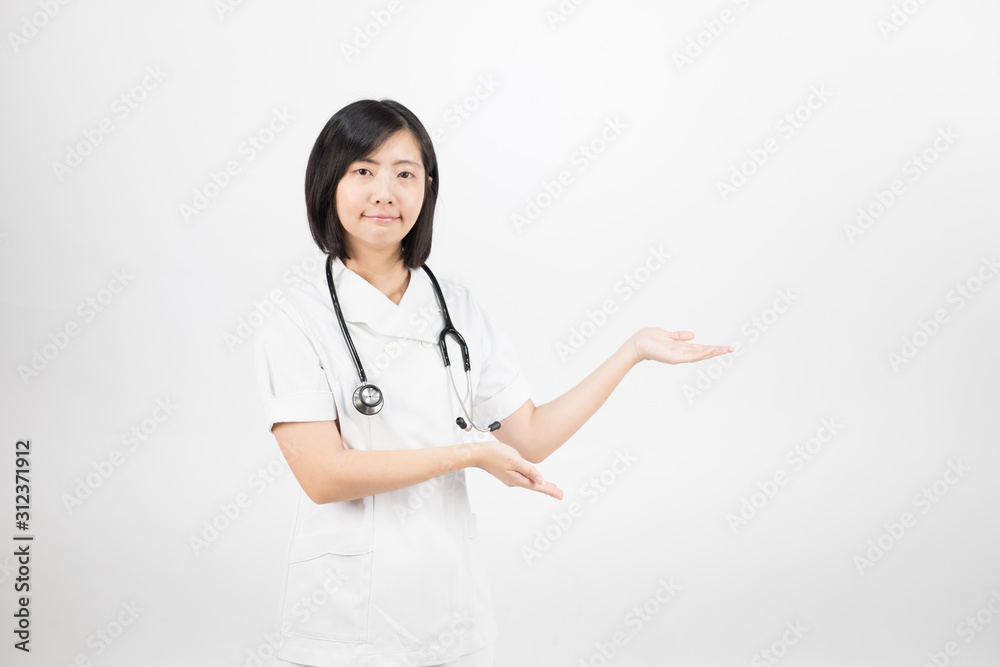 Young asian nurse with a stethoscope isolated over white background. Young asian nurse with a stethoscope isolated over white background.