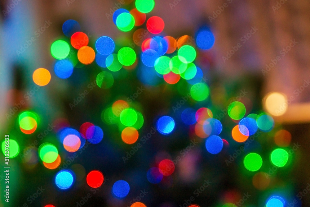Glitter multicolored light spots on navy brown backdrop defocused Glitter multicolored light spots on navy brown backdrop defocused