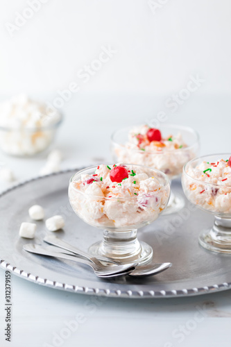 Dessert dishes filled with Ambrosia salad.