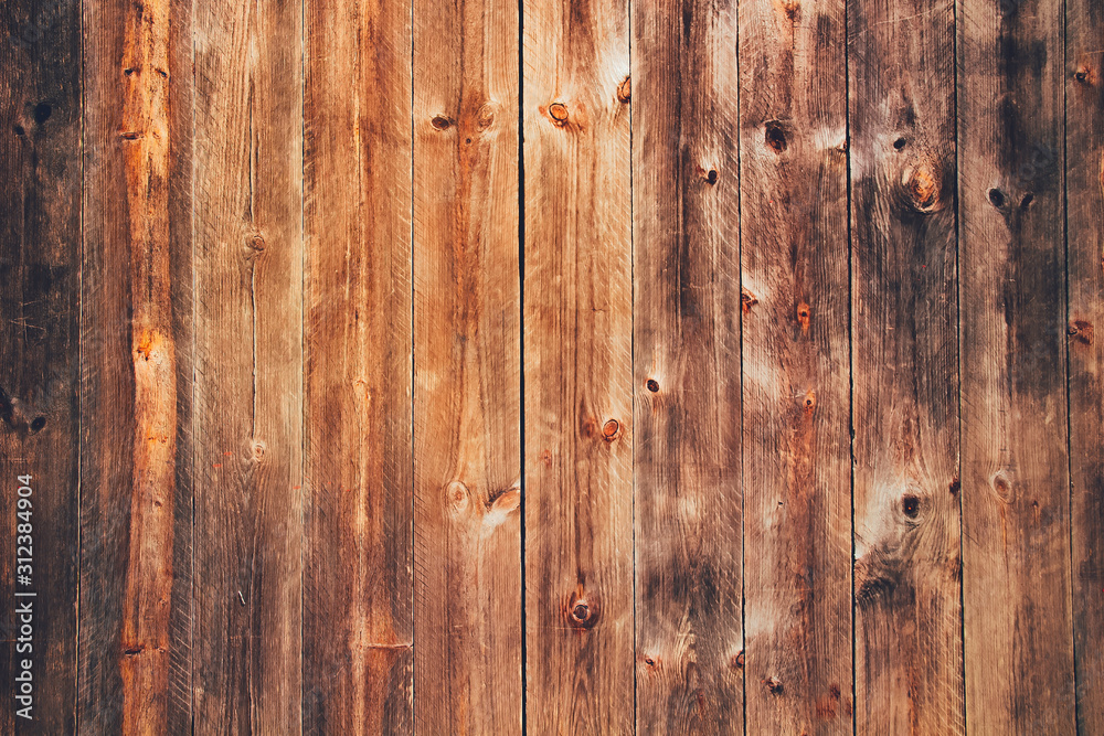 Wood brown grain texture, dark wall background. Pine wood plank texture background. Wood brown grain texture, dark wall background. Pine wood plank texture background.
