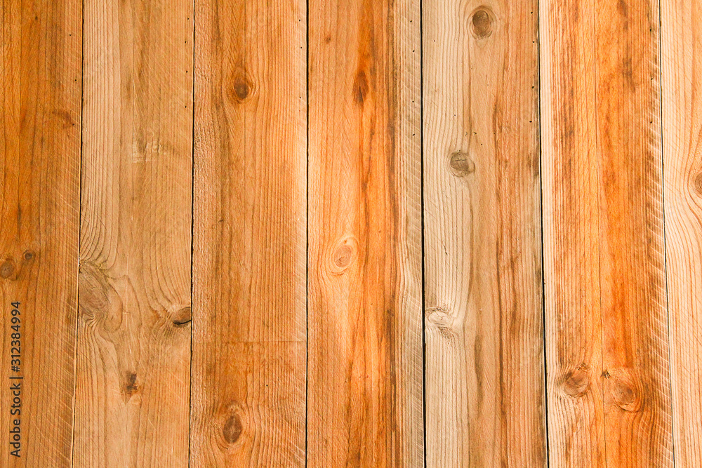 Wood brown grain texture, dark wall background. Pine wood plank texture background. Wood brown grain texture, dark wall background. Pine wood plank texture background.