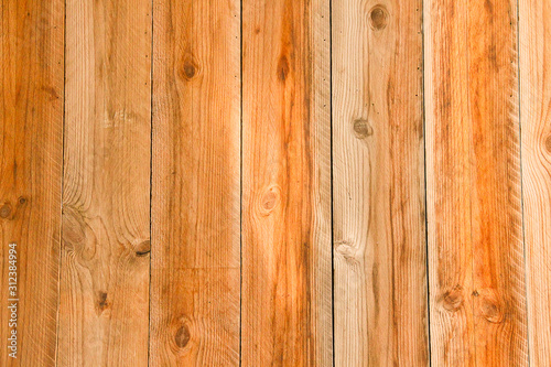 Wood brown grain texture, dark wall background. Pine wood plank texture background.