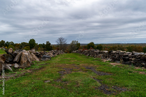 path with old stone walls in countryside setting