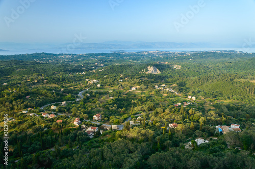 Corfu, a small town built in the mountains between the trees, panorama from the Kaiser throne vantage point.