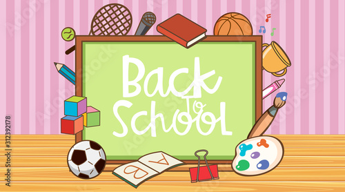 Back to school sign with board and school items photo