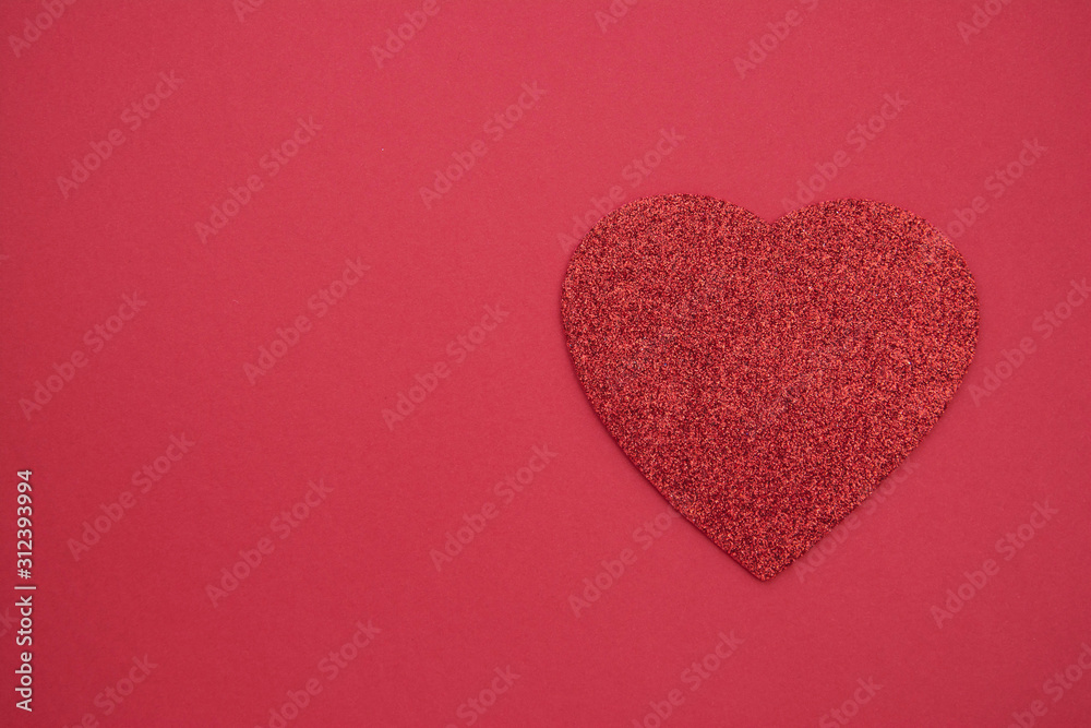 Love, Valentine's Day red background with glitter red heart. Flat lay. Copy space.