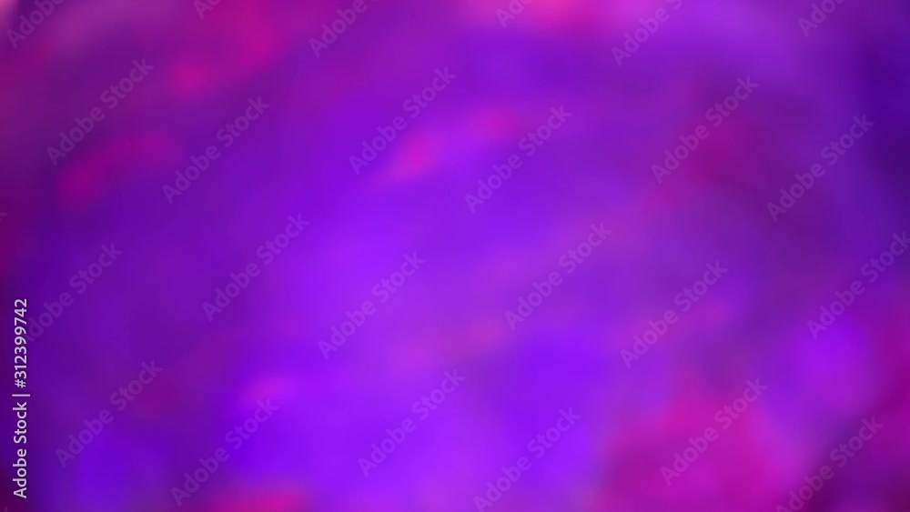 Moving violet bokeh lights. Festive defocused lights. Christmas and New year moving background Moving violet bokeh lights. Festive defocused lights. Christmas and New year moving background