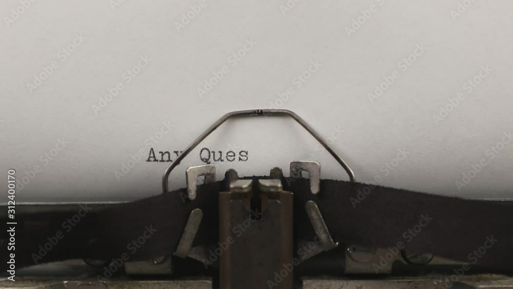 typing a quote any questions, old vintage typewriter with a sheet of paper