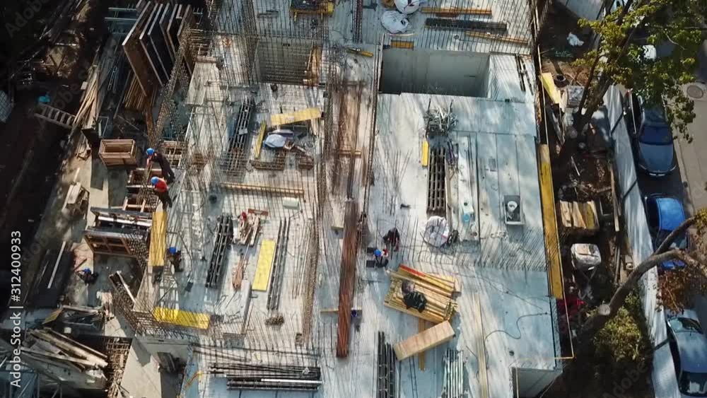 Aerial, top down, drone shot, over a construction site, on a sunny day, in Vilnius, Lithuania