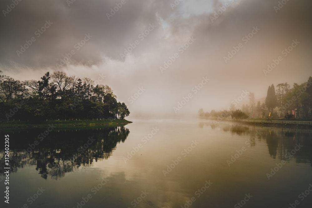 Fototapeta premium sunset over lake reflection
