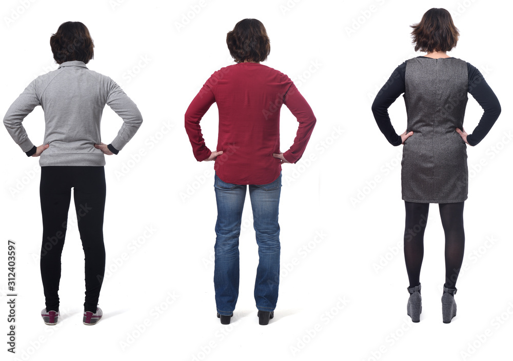 rear view of a woman dressed sporty casual and dress, hands on hip rear view of a woman dressed sporty casual and dress, hands on hip
