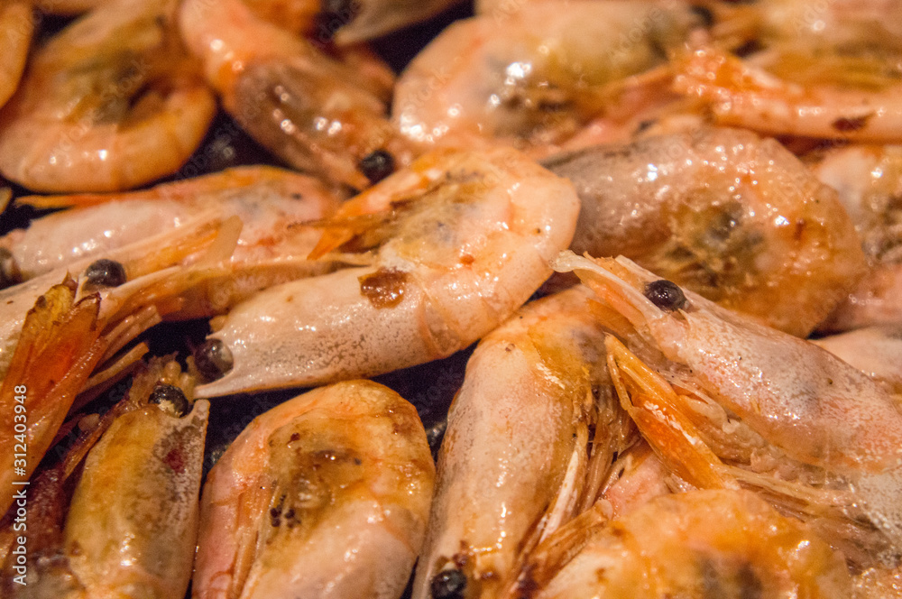 Large shrimp fried grill close-up.