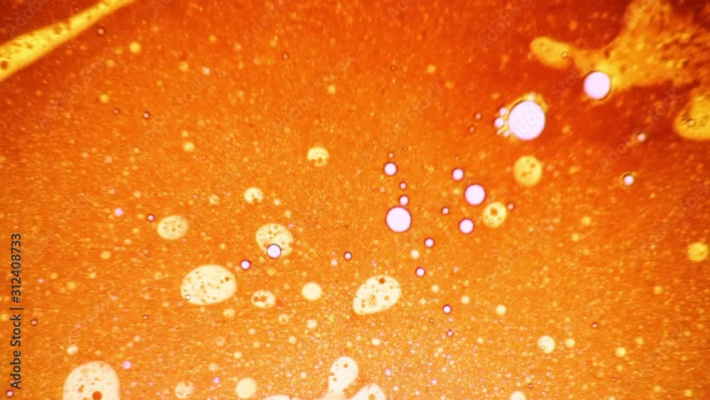 Scientific experiment, chemical reaction, fantastic structure of colorful bubbles. Spreading of disease-causing virus. Medical concept of healthy / diseased cells. Pathology diagnosis under microscope Scientific experiment, chemical reaction, fantastic structure of colorful bubbles. Spreading of disease-causing virus. Medical concept of healthy / diseased cells. Pathology diagnosis under microscope