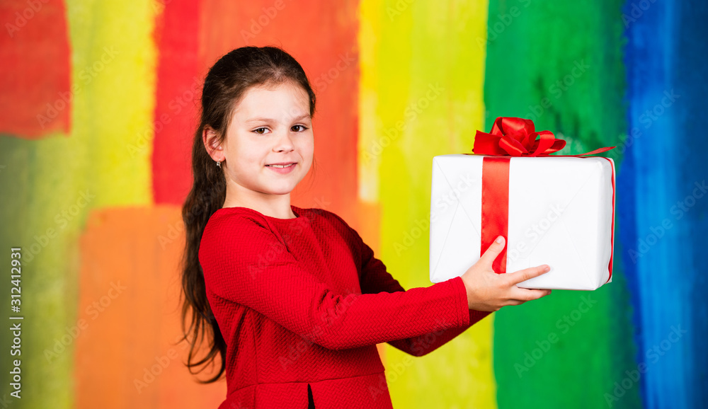 Lets celebrate. small girl carry santa present. big christmas sale. child hold gift box. boxing day concept. all i dream about. happy new year. winter holiday and xmas joy. seasonal shopping discount Lets celebrate. small girl carry santa present. big christmas sale. child hold gift box. boxing day concept. all i dream about. happy new year. winter holiday and xmas joy. seasonal shopping discount