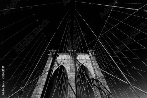 Brooklyn Bridge in New York , USA. Black and white image.