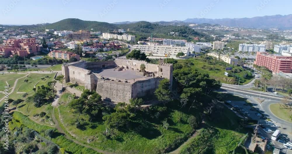 Aerial view of Fuengirola city, in southern Spain. There are various types of buildings to be seen. Aerial view of Fuengirola city, in southern Spain. There are various types of buildings to be seen.