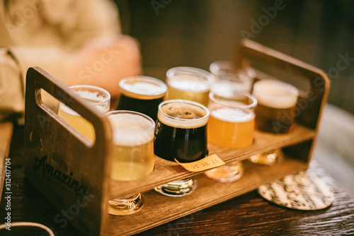 Close up of craft beer tasting flight on a bar table
