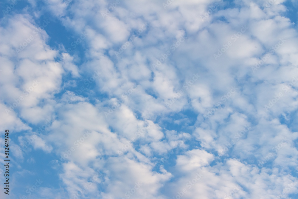 White clouds in the blue sky. Background. Texture White clouds in the blue sky. Background. Texture