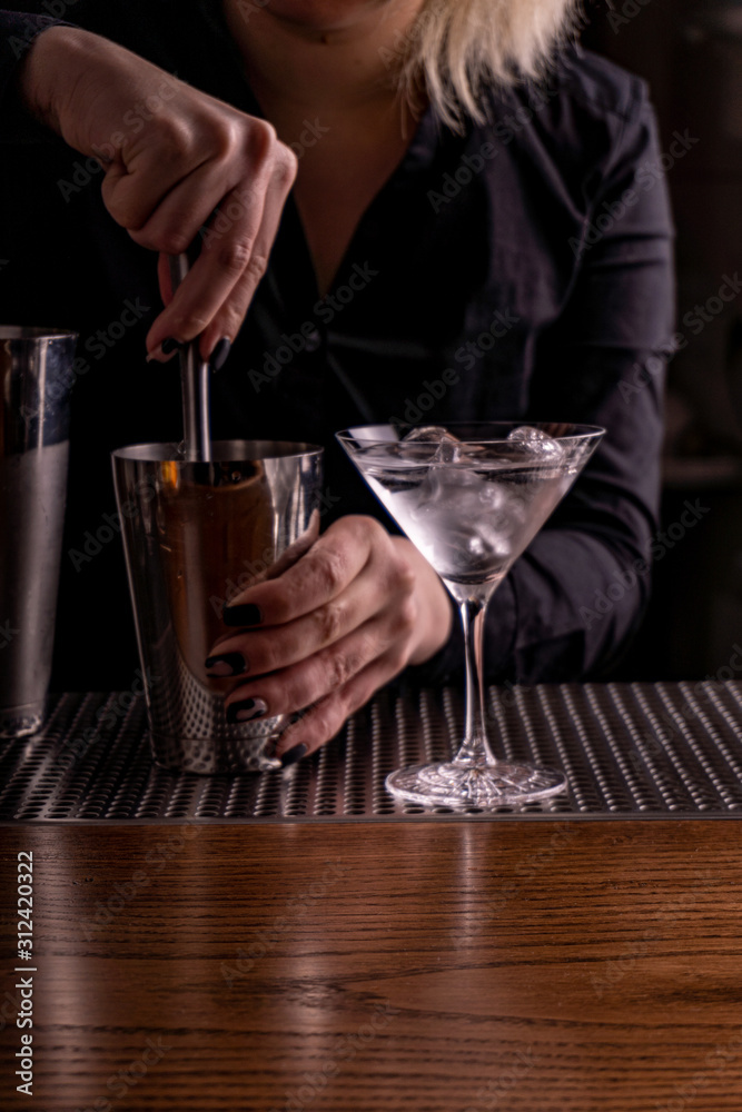 alcoholic beverage prepared in a glass with ice alcoholic beverage prepared in a glass with ice