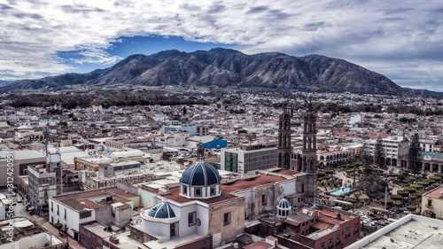 Tepic Cathedral in city centre of Tepic. State Nayarit in Mexico. Aerial drone view of Tepic and San Juan mountain. photo