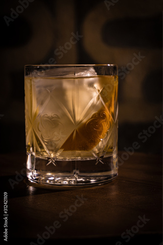 alcoholic beverage prepared in a glass with ice