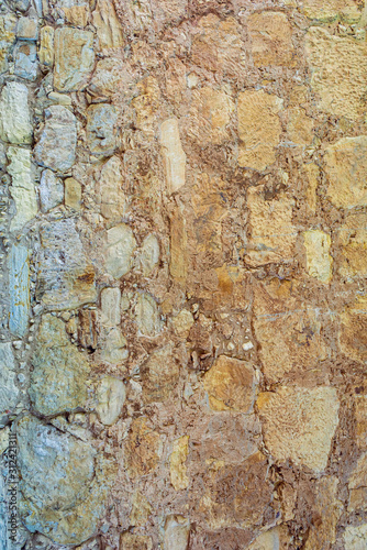 old stone and stucco wall