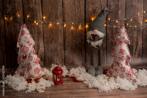 Christmas background. Christmas red lantern and handmade Christmas trees