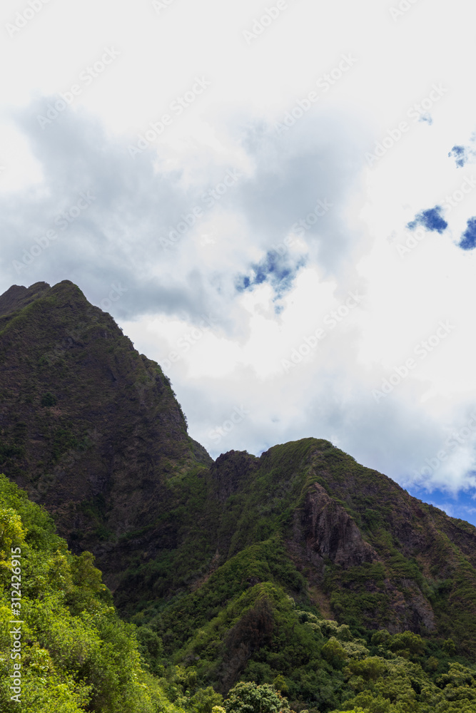 Luscious, Hawaiian mountains on a cloudy day.