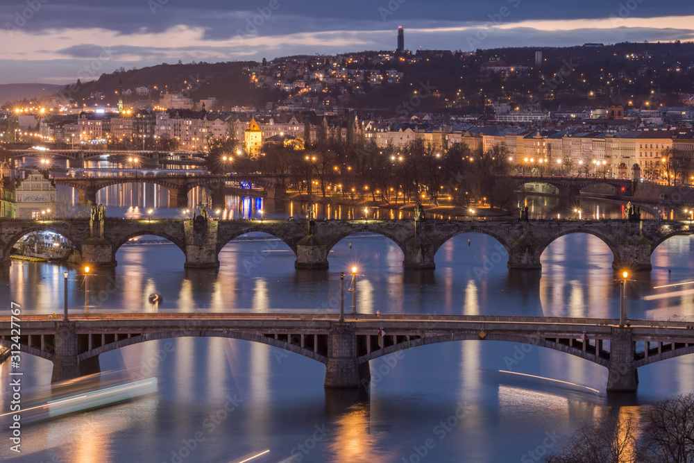 Bridges in Prague over Vltava river at sunset, Czech Republic