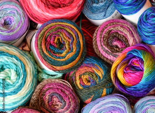 Multiple Brightly Colored Skeins of Yarn