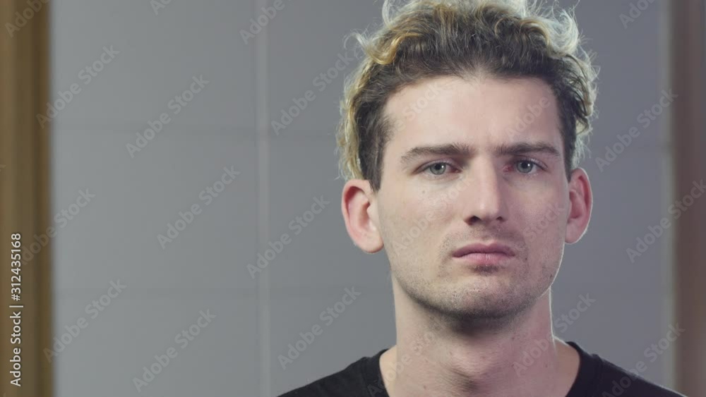 White male with a serious expression