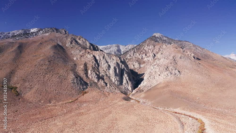 Aerial Drone pushing out on mountains in Death valley Nevada USA Aerial Drone pushing out on mountains in Death valley Nevada USA