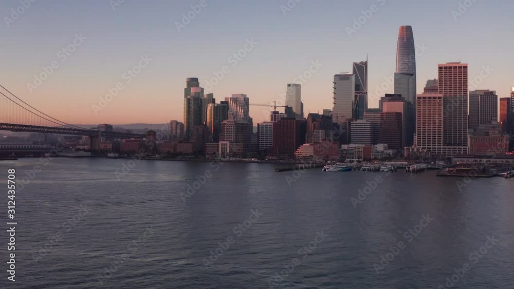 Aerial Drone Flyover San Francisco city and Bay Bridge at Sunrise Aerial Drone Flyover San Francisco city and Bay Bridge at Sunrise