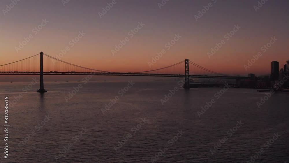 Aerial Drone Flyover San Francisco Bay Bridge at Sunrise Aerial Drone Flyover San Francisco Bay Bridge at Sunrise