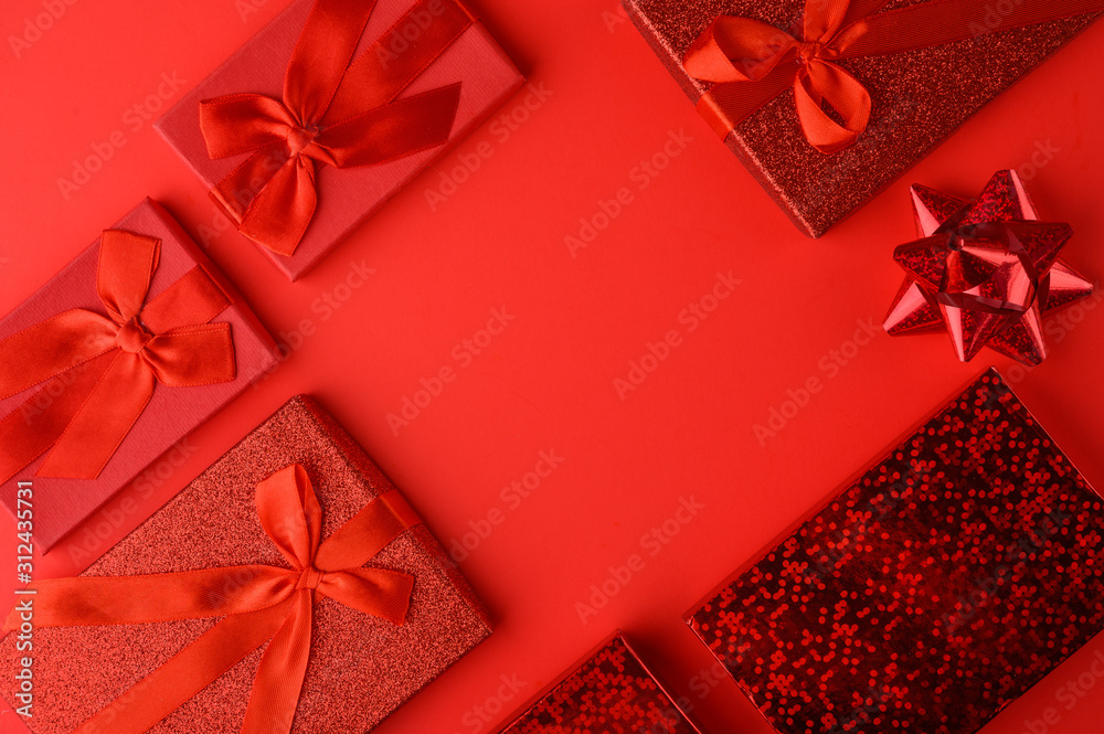 Frame of red gifts on a red background, Valentine's Day, love day. Design and congratulation. Horizontal frame. Frame of red gifts on a red background, Valentine's Day, love day. Design and congratulation. Horizontal frame.