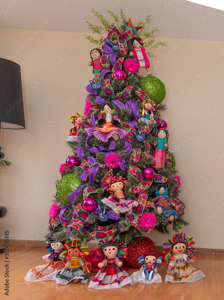 Christmas tree with traditional Mexican decorations, rag dolls ...