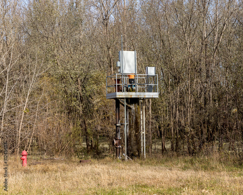 City water supply well pump providing water from aquifer next to the Sangamon River photo