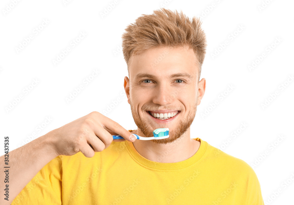 Young man with toothbrush on white background Young man with toothbrush on white background