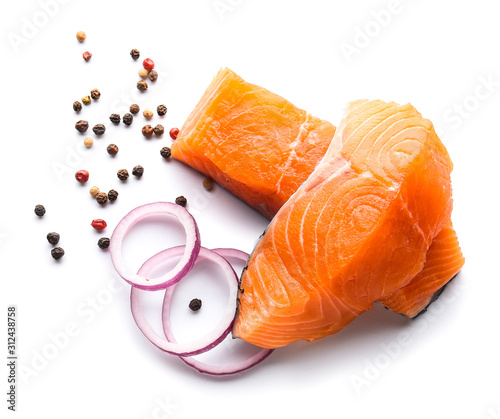 Raw salmon fillet on white background photo