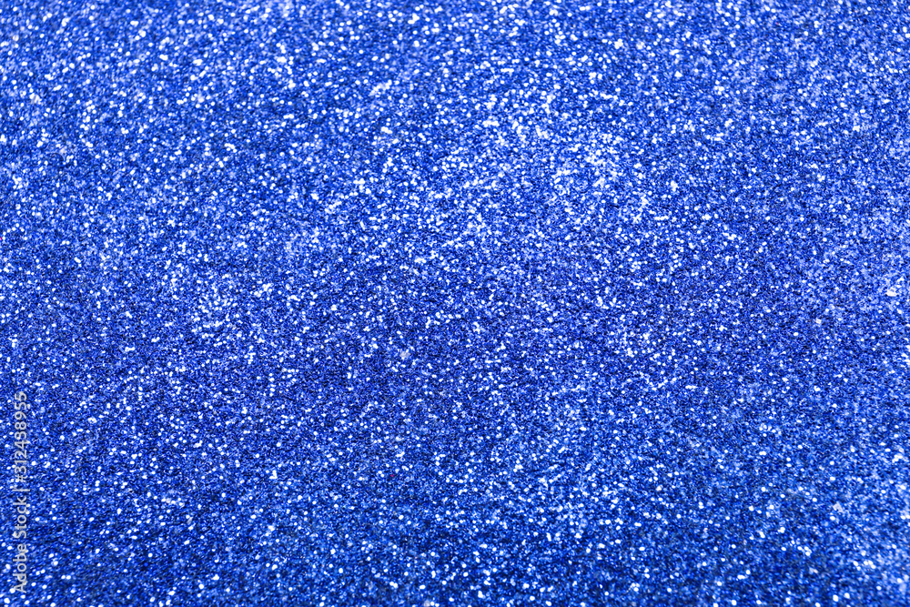 Obraz premium Texture of blue paper with glitter, closeup