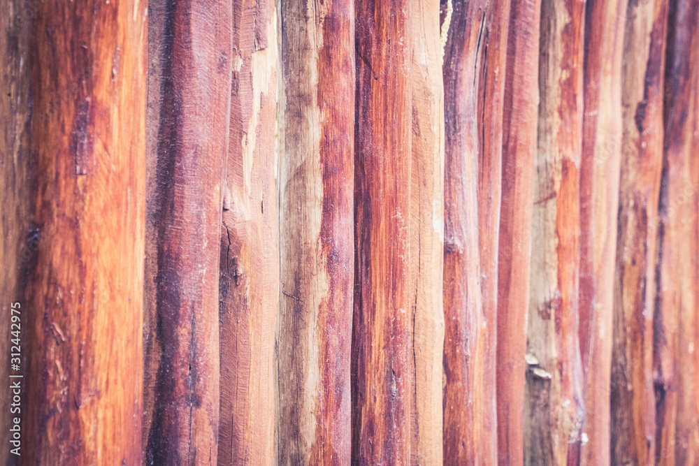Close up round logs wooden fence Close up round logs wooden fence