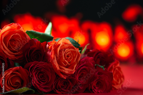 Red roses with a red background  congratulations on Valentine s Day  happy birthday  or happy love day. Romance  postcard