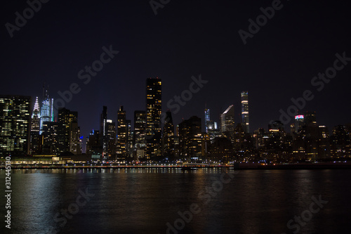 Manhattan Skyline at night in New York City © Renata