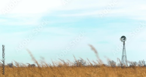 old-fashioned windmill on prairie
