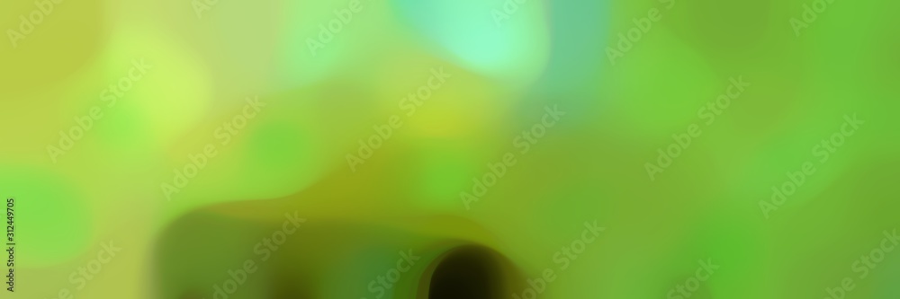 blurred horizontal background bokeh graphic with yellow green, moderate green and light green colors and space for text blurred horizontal background bokeh graphic with yellow green, moderate green and light green colors and space for text