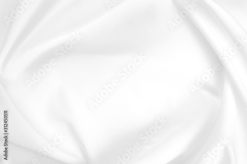 Abstract white fabric texture background. Cloth soft wave. Creases of satin, silk, and cotton.	
